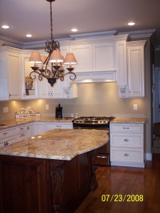 white painted cabinets with stained solid cherry island